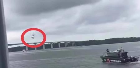 Malaysia in turmoil Police helicopter crashes into river Viral video